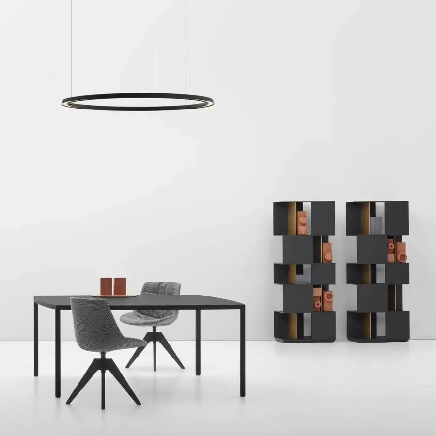 Superior MDF Italia Tense Curve table with oval form and sleek steel legs in a striking black finish