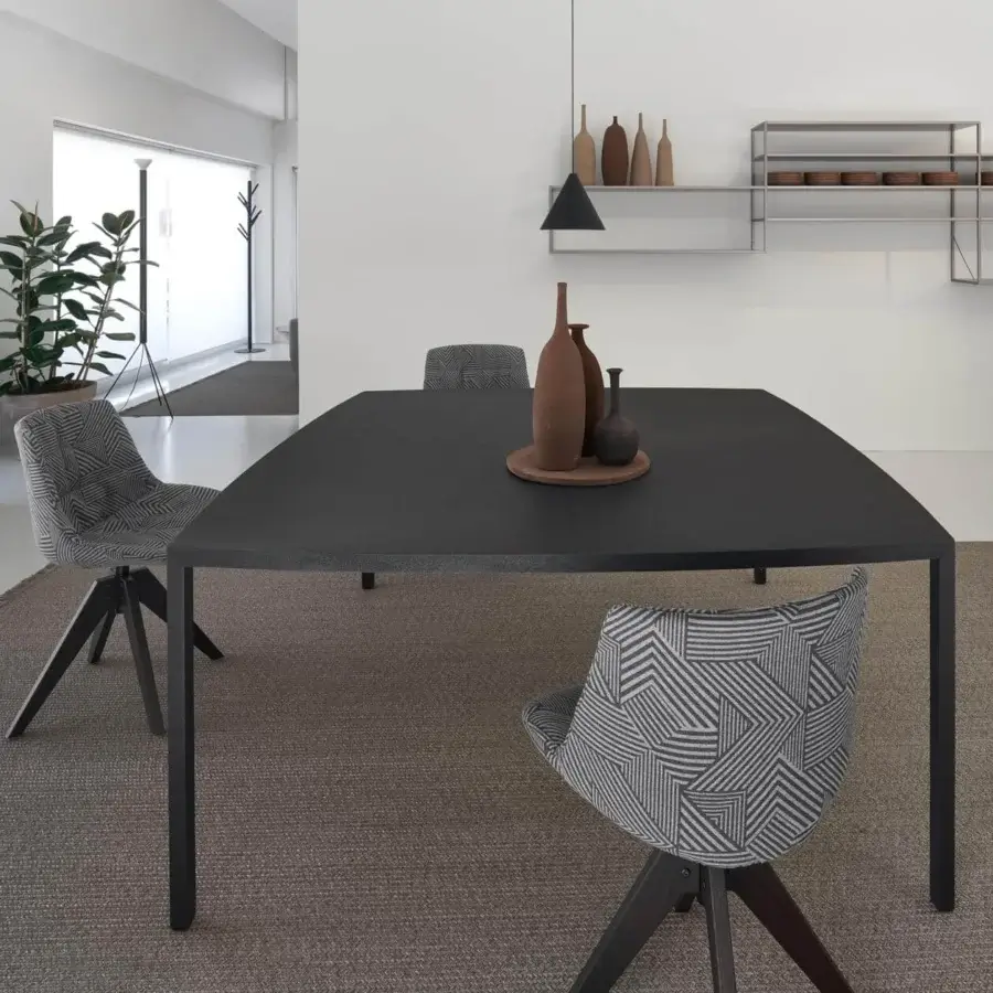 Distinguished MDF Italia Tense Curve table crafted in carbonized wood with matte dark gray composite and steel legs