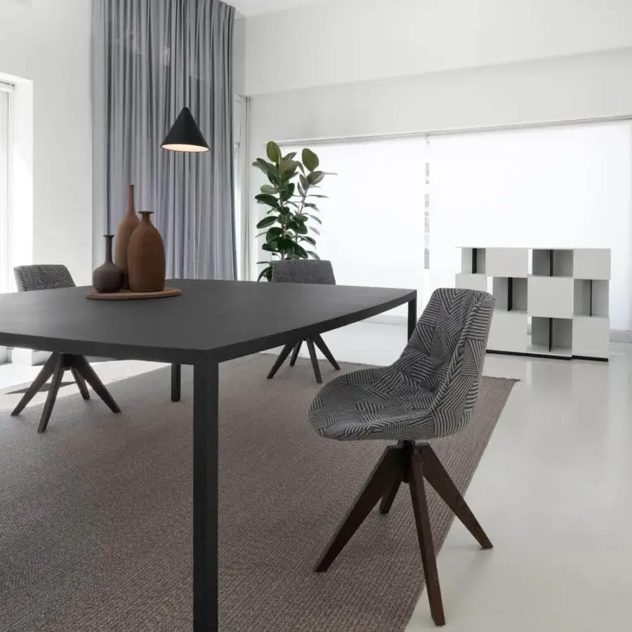 Elegant MDF Italia Tense Curve table built in carbonized wood with steel legs and matte finish