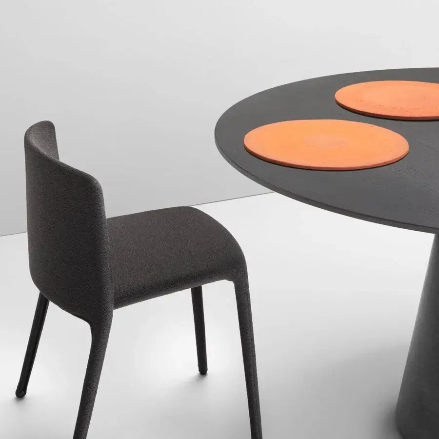 Refined MDF Italia Achille chair upholstered in dark gray textured fabric with a metal tubing frame built with polyurethane rubbers