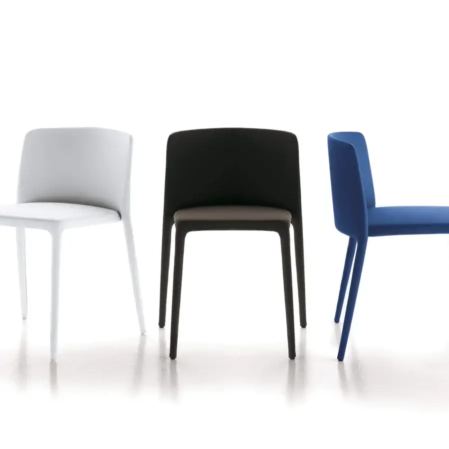 Refined MDF Italia Achille chair fully upholstered in smooth matte blue fabric with a minimalist geometric silhouette
