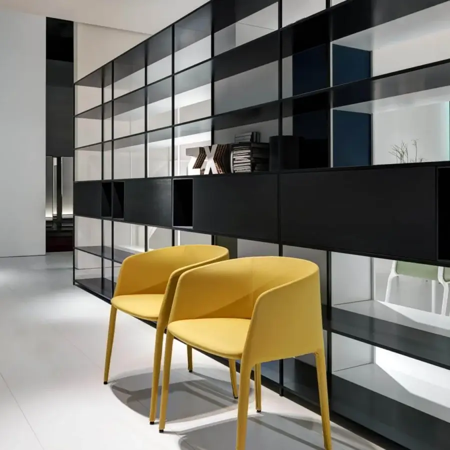 Distinguished MDF Italia Achille armchair upholstered in smooth mustard yellow textile with fabric covered legs