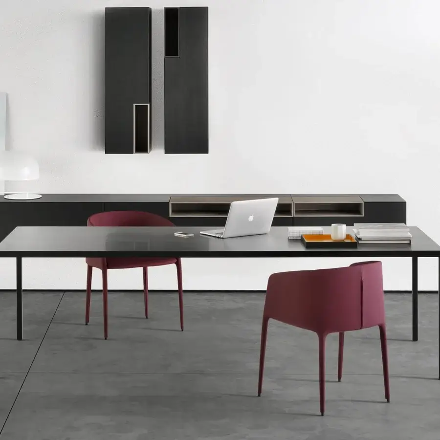 Elegant MDF Italia Achille armchair upholstered in matte reddish-purple textile with metal tubing frame crafted for comfortable seating