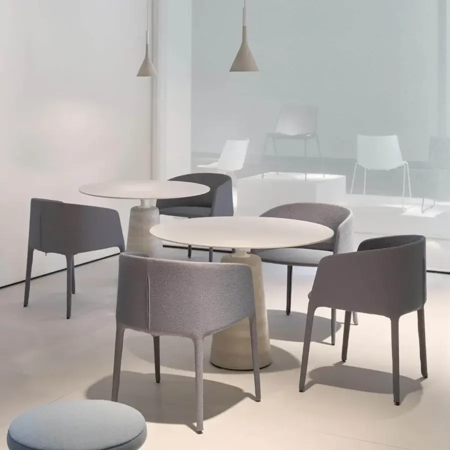 Exceptional MDF Italia Achille armchair fully upholstered in light gray textured textile with wraparound backrest and matching legs