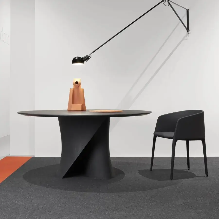 Superior MDF Italia Achille armchair fully upholstered in black fabric or leather with a matte finish