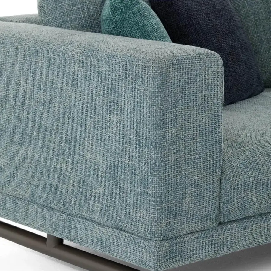 Distinguished Presotto San Marino sofa built with textured blue-grey textile upholstery and peltro varnished metal feet