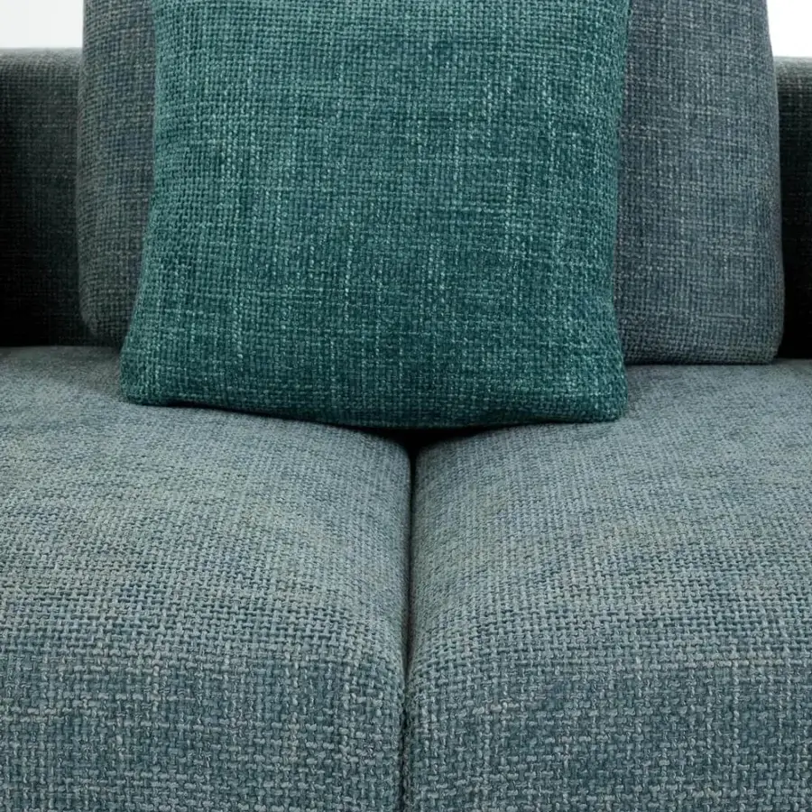 Sophisticated Presotto San Marino sofa crafted in muted blue-grey textured fabric with peltro varnished metal feet and teal cushion