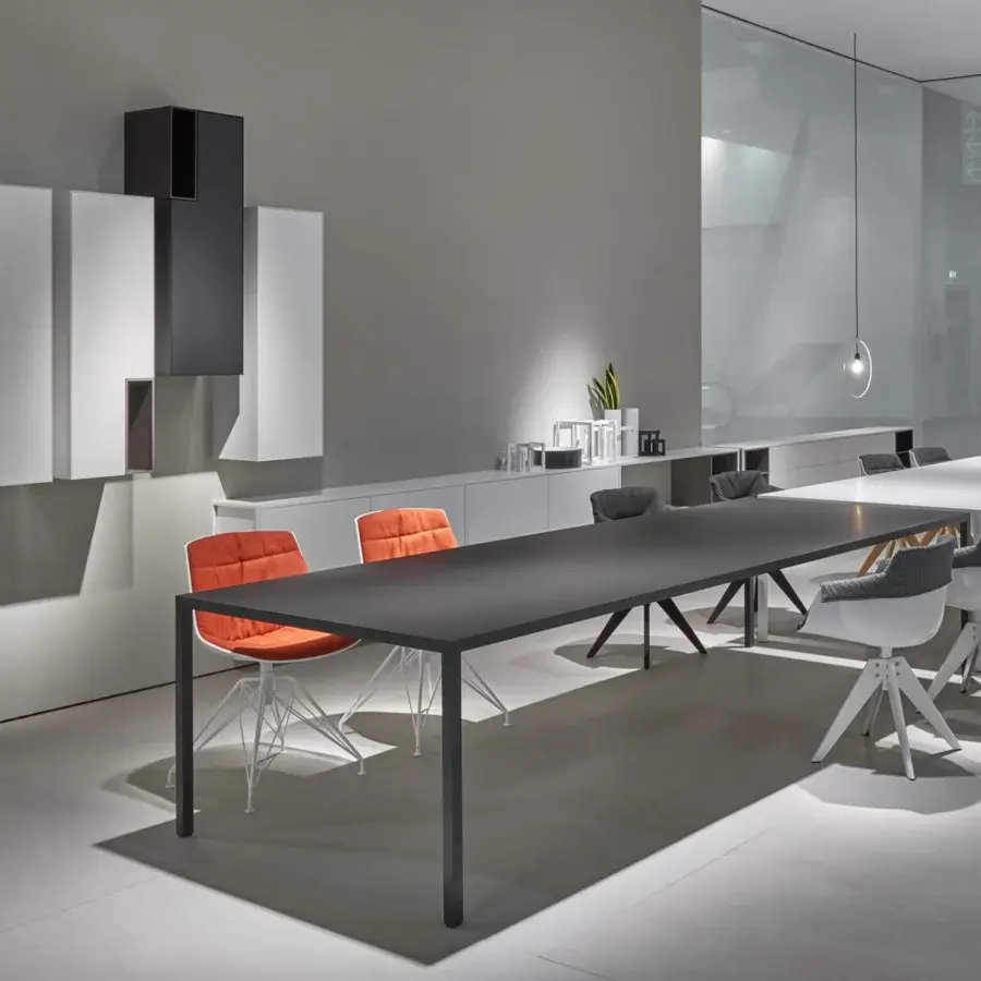 Elegant MDF Italia Tense conference table with dark matte black lacquer and aluminum top-access point built for seamless wiring management