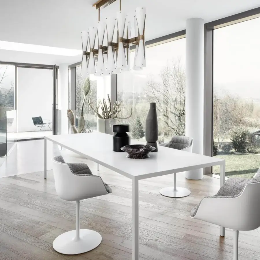 Distinguished MDF Italia Tense conference table with a lightweight tabletop and slender legs in matte white lacquer