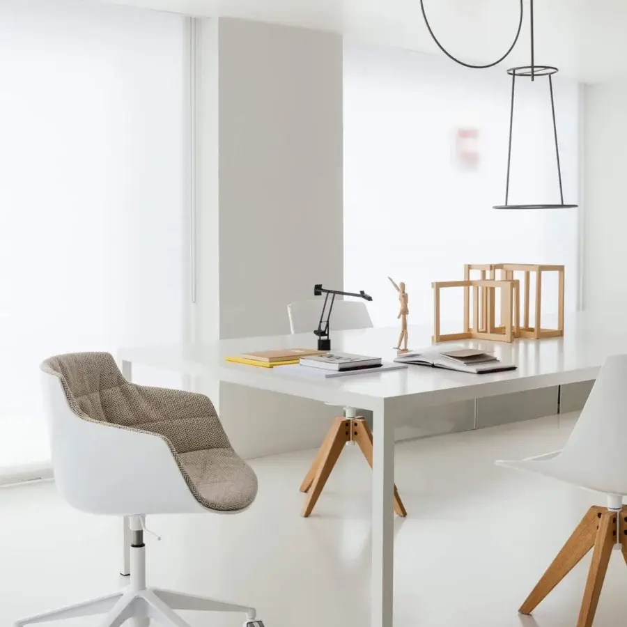Innovative MDF Italia Tense conference table with a matte white lacquer tabletop and natural wood accent leg