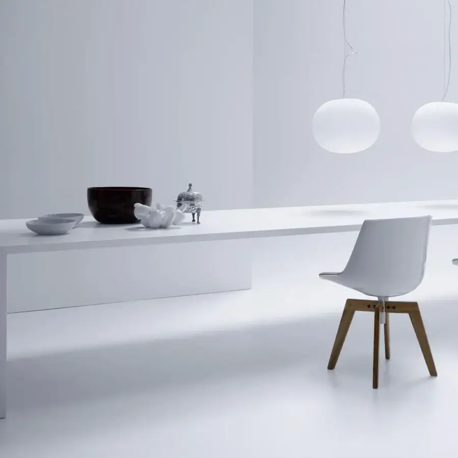 Elegant MDF Italia Tense table built in white acrylic resin and rock mineral with refined matte finish