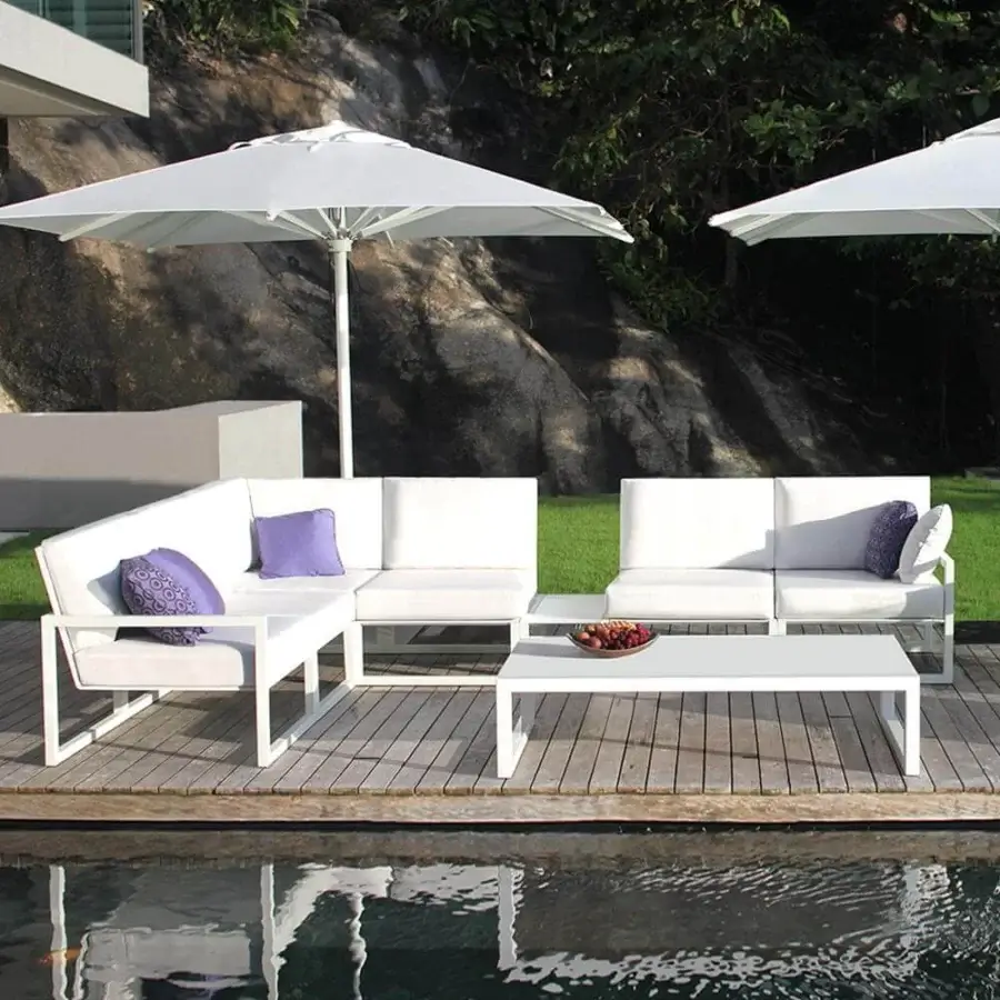 Exclusive Royal Botania Ninix lounge sectional with stainless steel frame and white Batyline cushions in a modular design