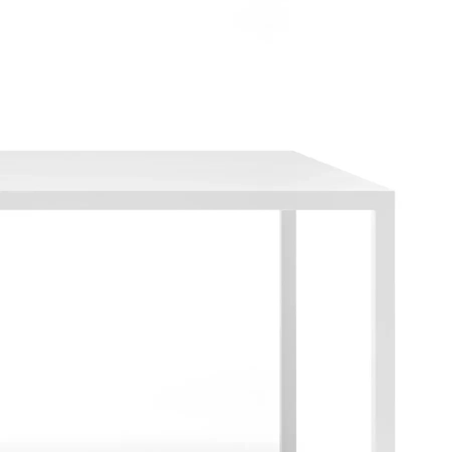 Elegant MDF Italia Tense table built with matte white acrylic resin and rock minerals, displaying a geometric design with black leg details
