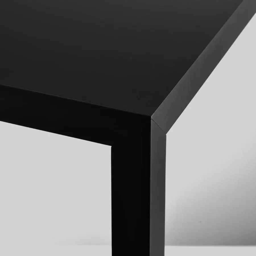 Elegant MDF Italia Tense table crafted in black acrylic resin and rock mineral with a sleek matte finish