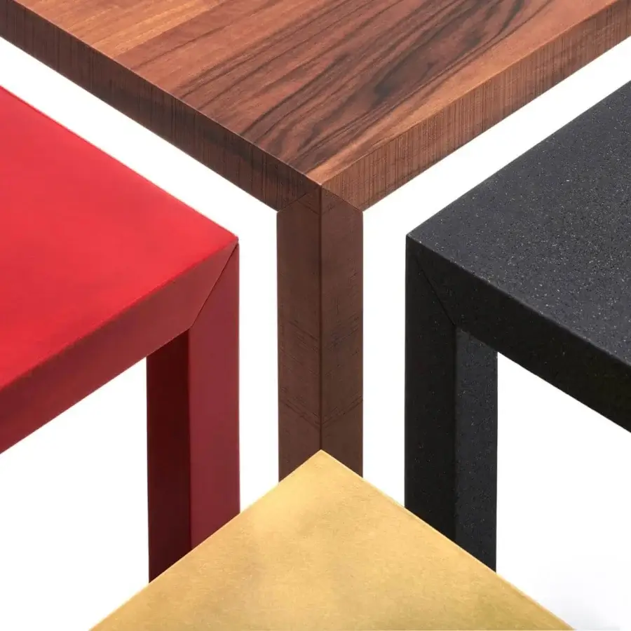 Superior MDF Italia Tense Material coffee table with intersecting sections in gold, red, black and dark brown wood grain