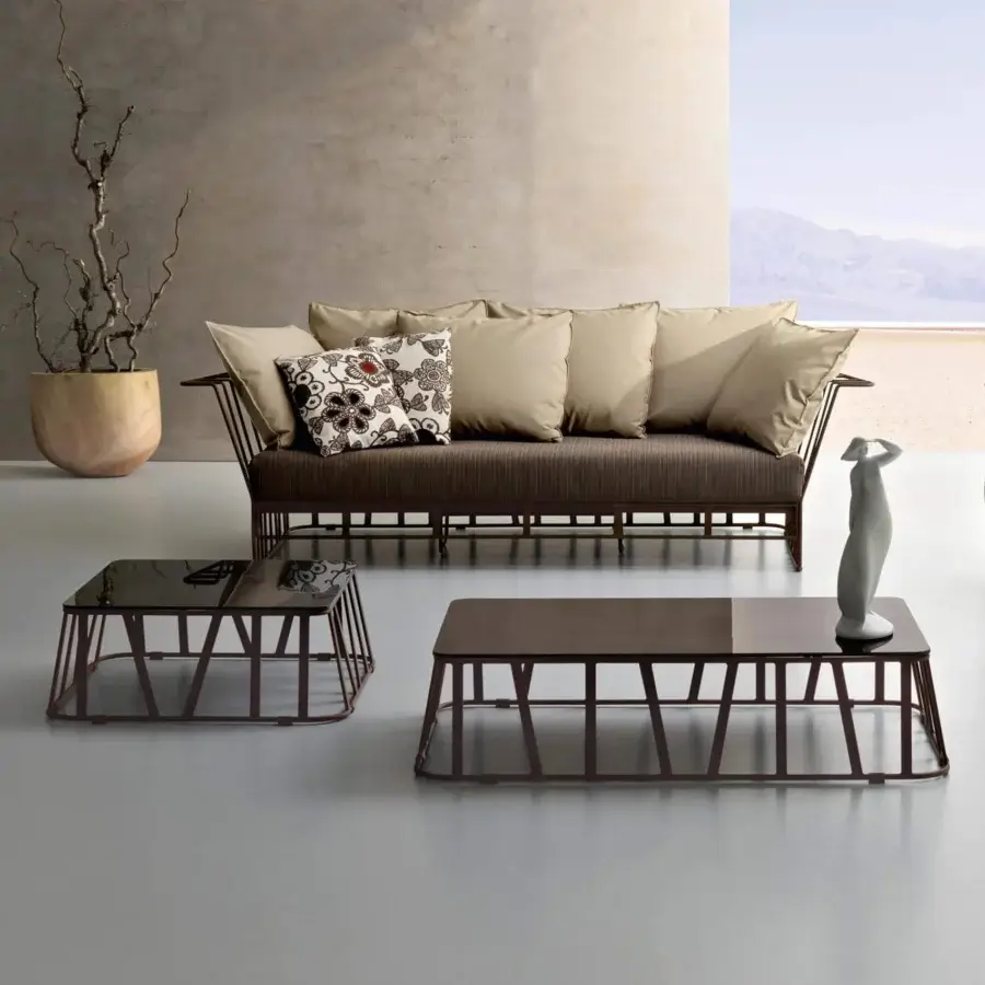 Elegant Roberti Rattan Hamptons Graphics coffee table with dark powder-coated aluminum and lacquered glass top