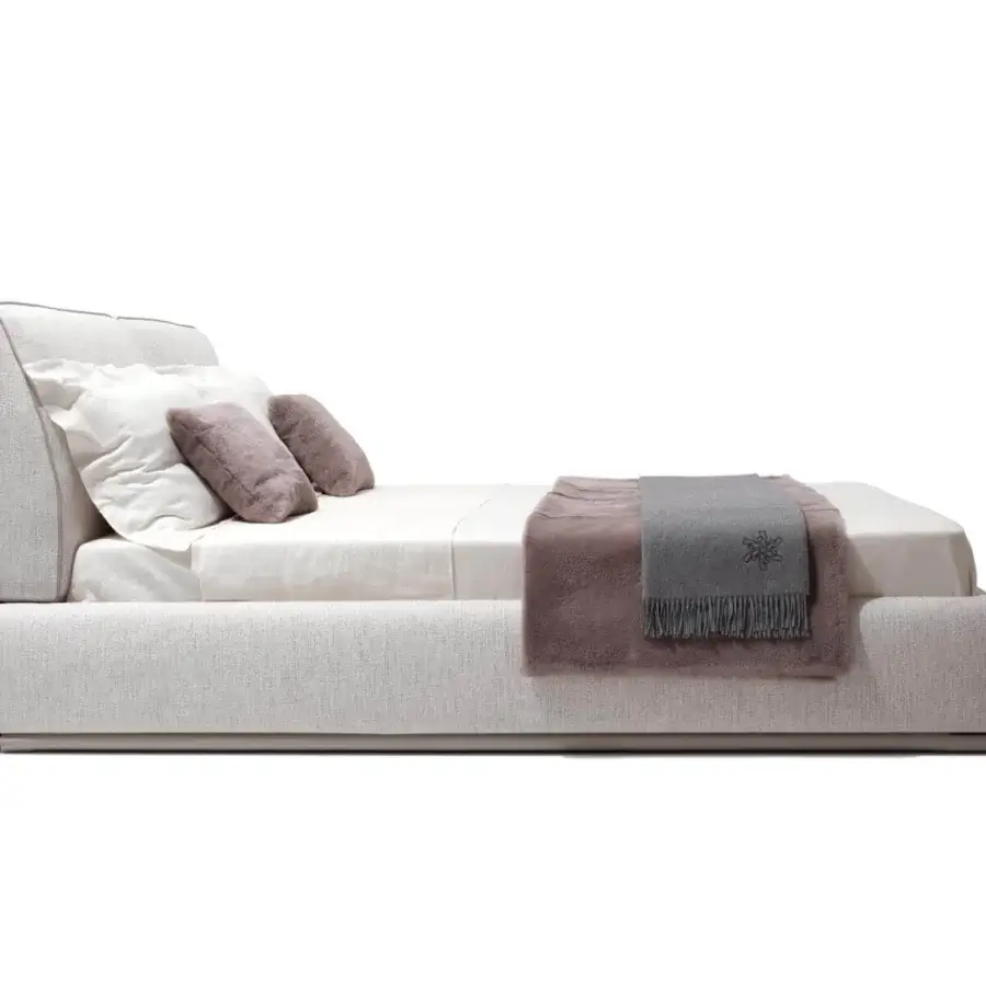 Exceptional Giorgetti Adam bed with light gray upholstery, rounded edges and a cushioned headboard with tonal piping