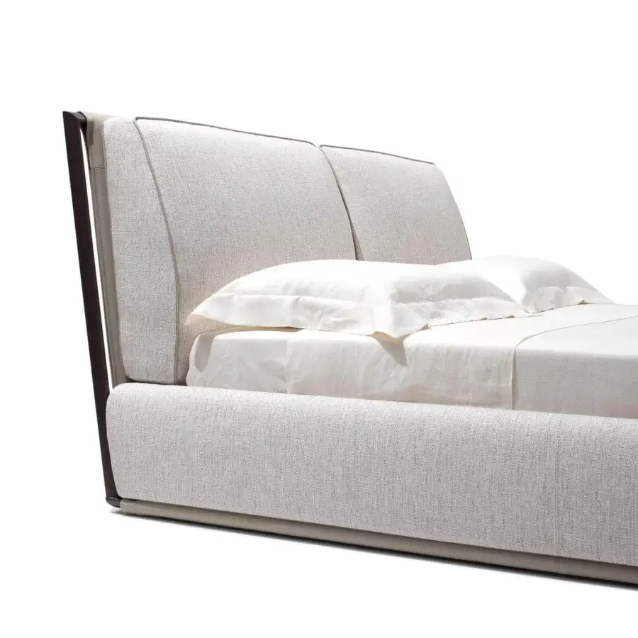 Elegant Giorgetti Adam bed in light gray woven fabric displays a low profile with plush cushioned headboard and visible metal structure