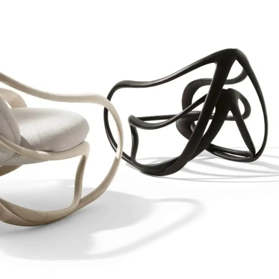 Superior Giorgetti Move lounge chair with a stunning organic silhouette crafted in light solid ash wood with gray textile cushioning