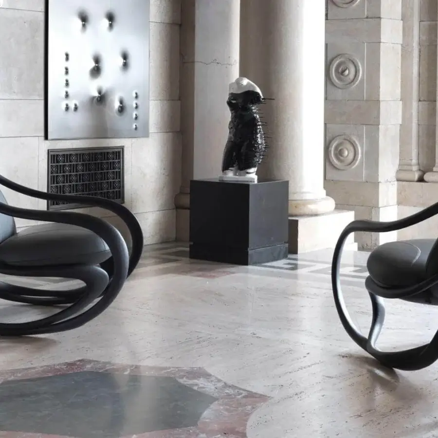 Exceptional Giorgetti Move lounge chair with sculpted solid ash wood and dark upholstered seating for sophisticated modernity