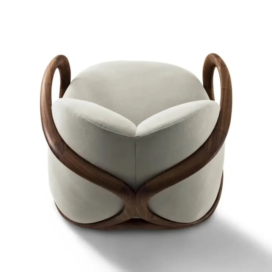 Superior Giorgetti Hug lounge chair with inviting light fabric upholstery and a supportive canaletto walnut frame with smooth finish