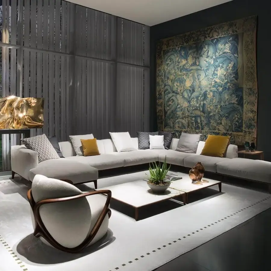 Exceptional Giorgetti Hug lounge chair with softly-shaped light grey upholstery and a visible canaletto walnut structure