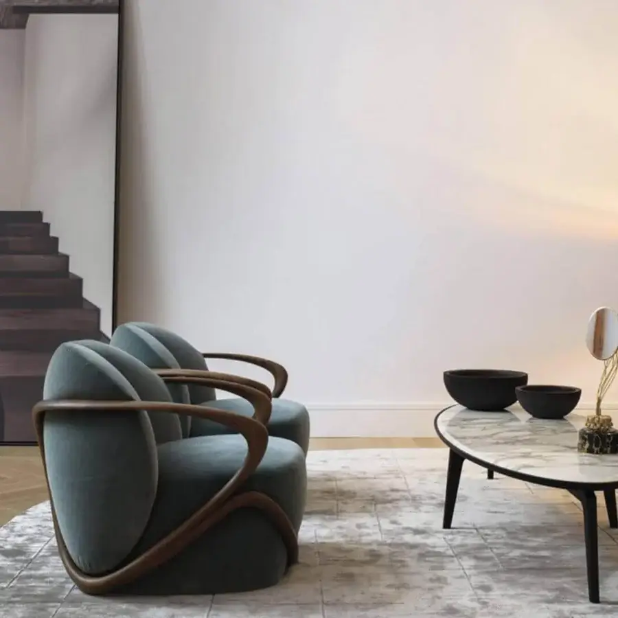Meticulous Giorgetti Hug lounge chair with teal upholstery and a frame crafted from twenty pieces of solid canaletto walnut