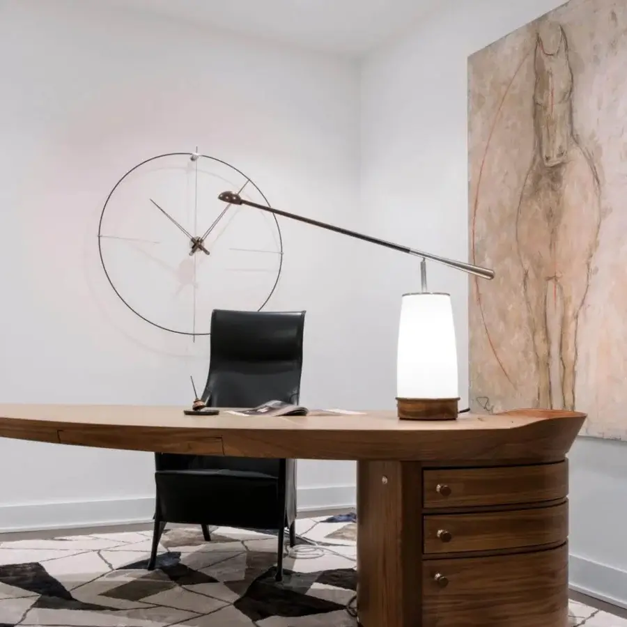 Superior Giorgetti Erasmo desk crafted in canaletto walnut with a leaf-shaped ebony macassar top and satin sheen