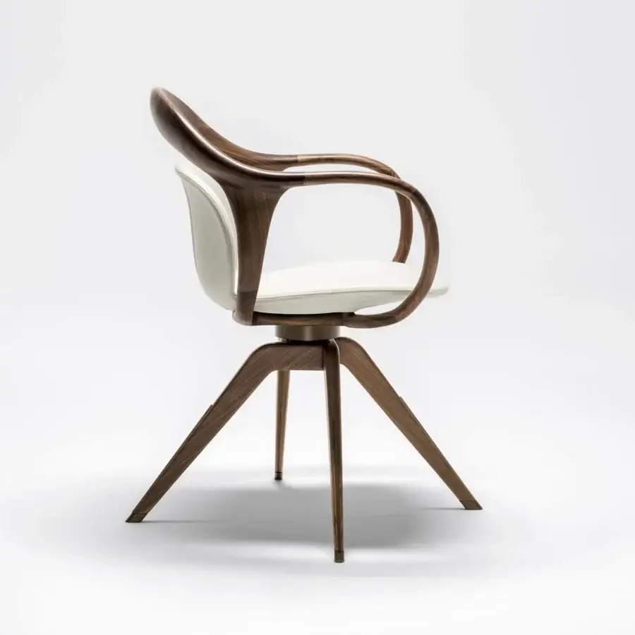 Exceptional Giorgetti Norah armchair with curved canaletto walnut framing and light textile upholstery with bronze finish