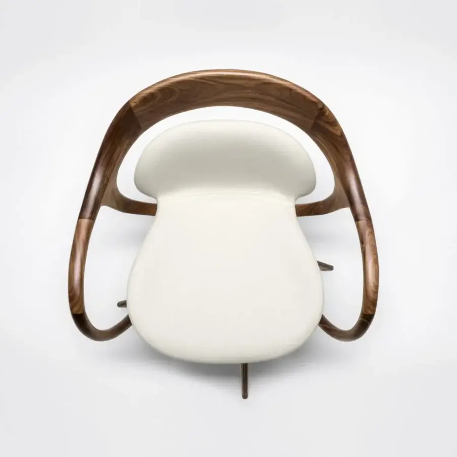 Exclusive Giorgetti Norah armchair upholstered in creamy white textile with glossy canaletto walnut and bronze metal accents