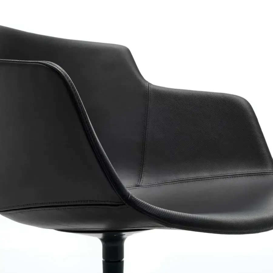 Distinguished MDF Italia Flow chair with padded Nuvola leather shell, sleek black exterior and matte aluminum swivel base