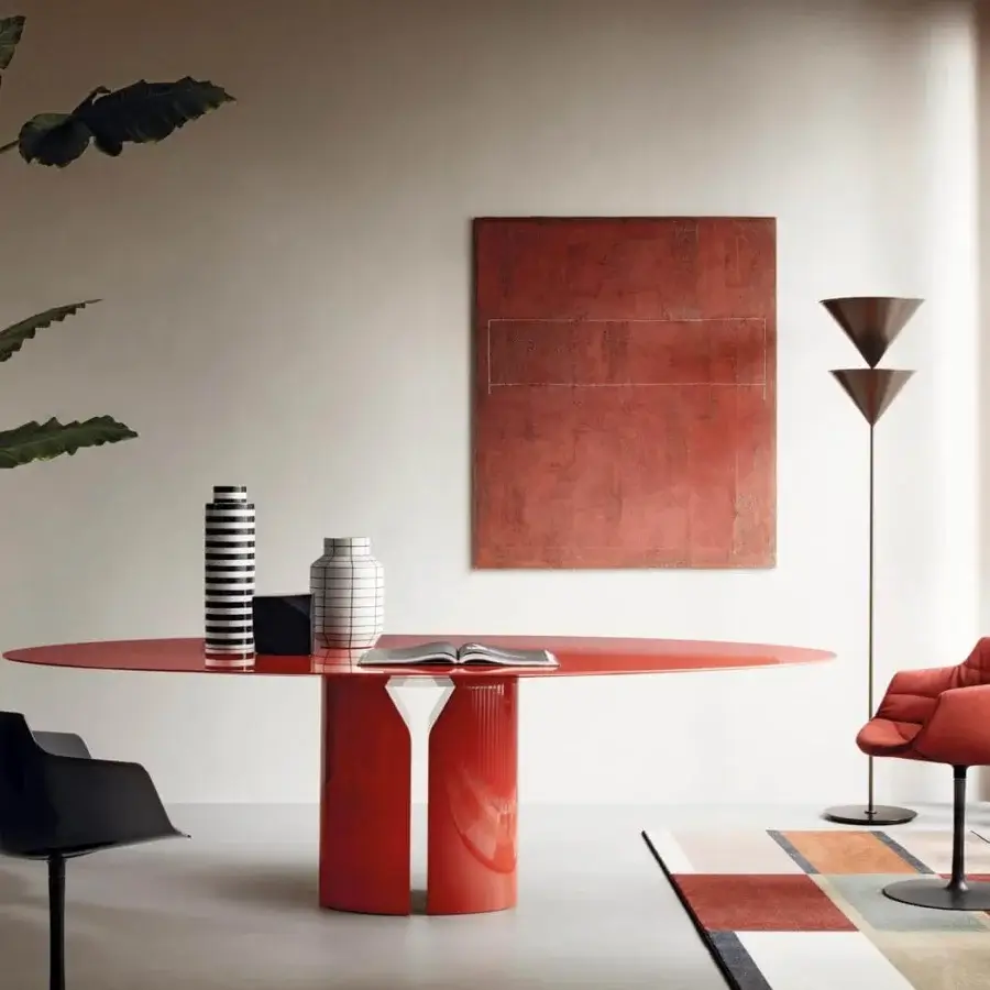 Sophisticated MDF Italia Flow chair with reddish-orange textile upholstery and black painted aluminum base