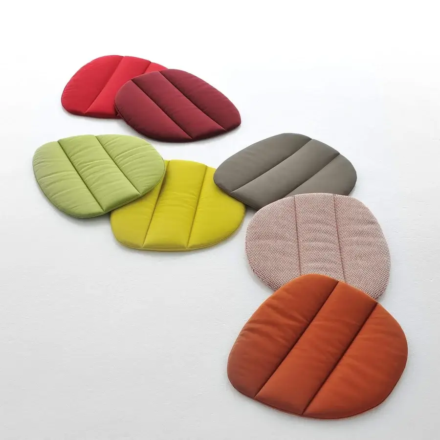 Distinguished MDF Italia Flow chair with quilted textile upholstery in red, green, and orange hues and cast aluminum base