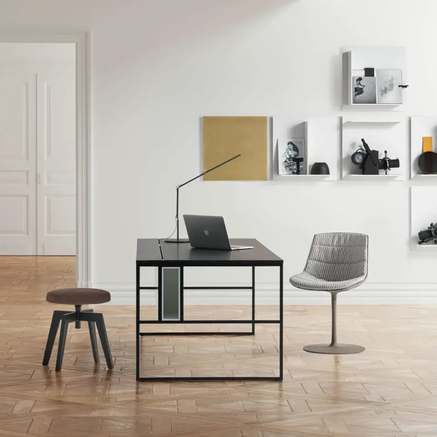 Sophisticated MDF Italia Flow chair with a curved seat upholstered in patterned gray textile and neutral tone aluminum base