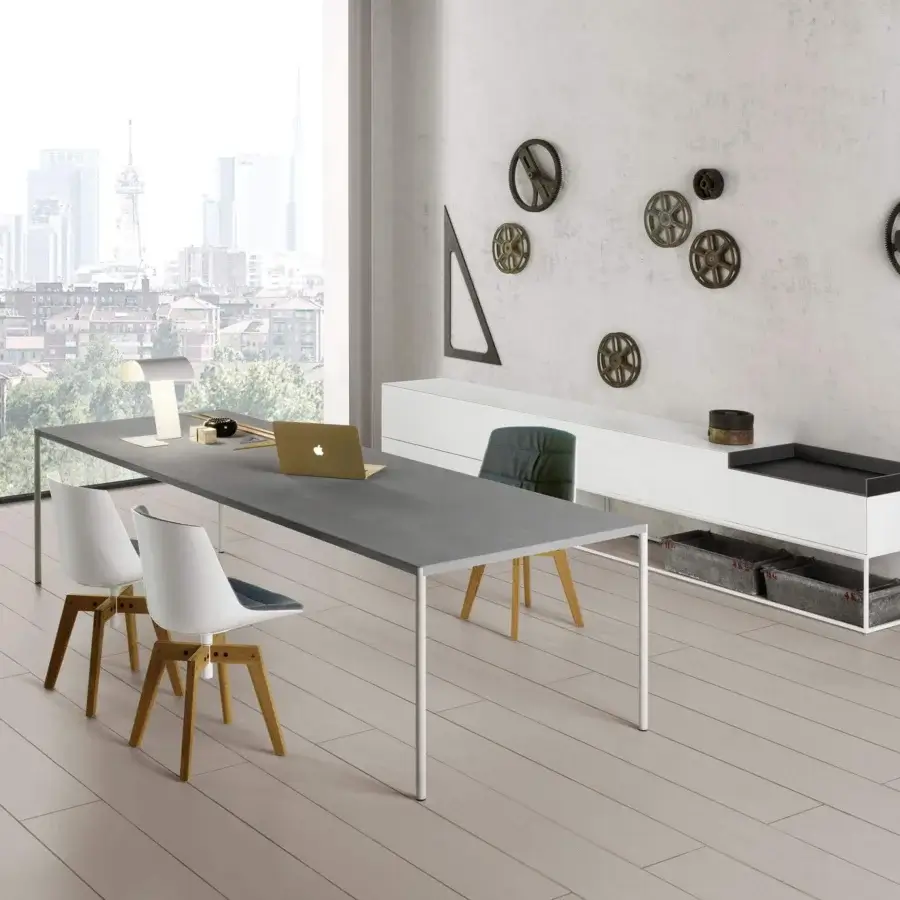 Distinguished MDF Italia Flow chair with white matte shell, light wood legs and blue grey padded seat