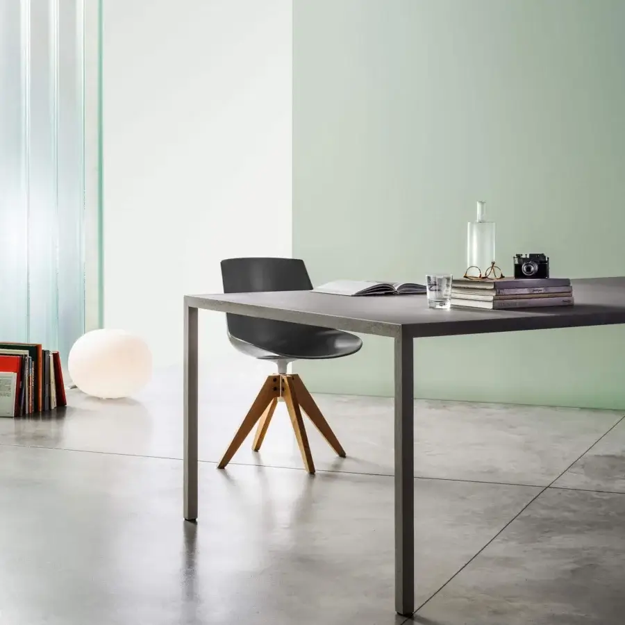 Exceptional MDF Italia Flow chair with a dark gray curved shell and light-toned wood splayed base crafted for comfort