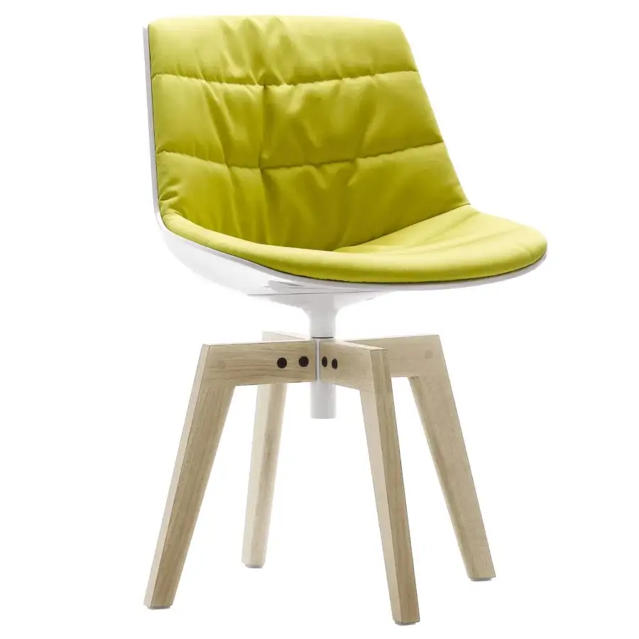 Elegant MDF Italia Flow chair with chartreuse textile upholstery, white frame and light-toned wooden legs for harmonious comfort