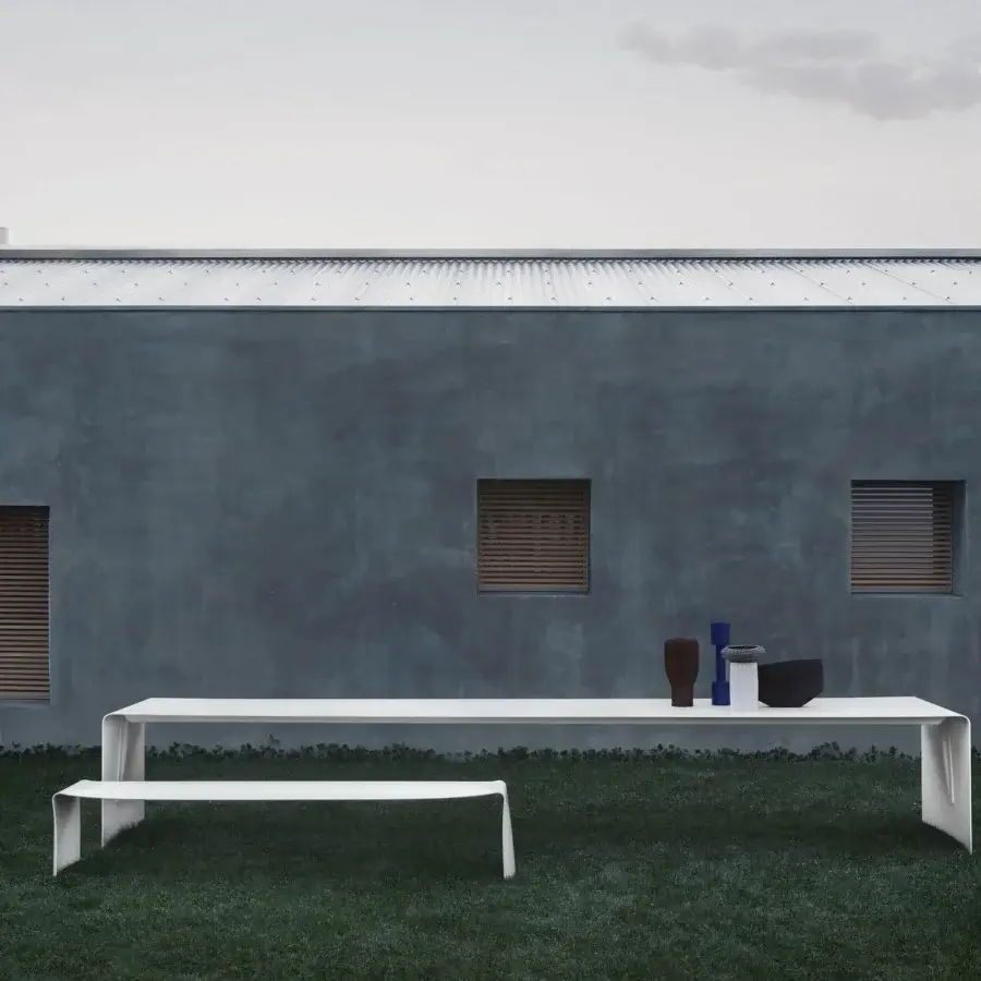 Distinguished MDF Italia Le Banc bench crafted from a single curved sheet of white-painted aluminum with seamless silhouette