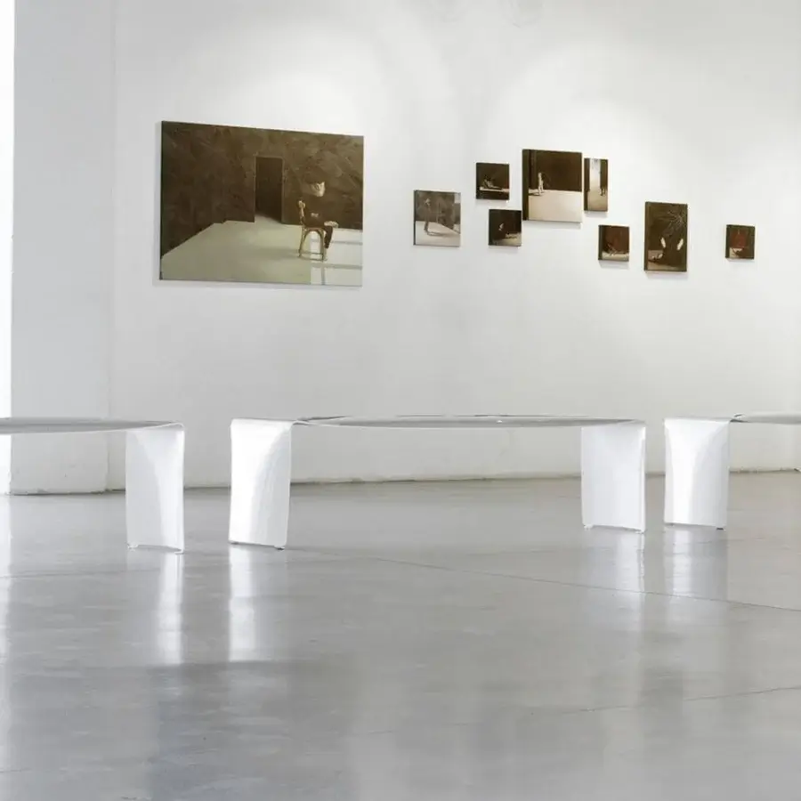 Avant-garde MDF Italia Le Banc bench crafted from a single white bent sheet with a glossy finish