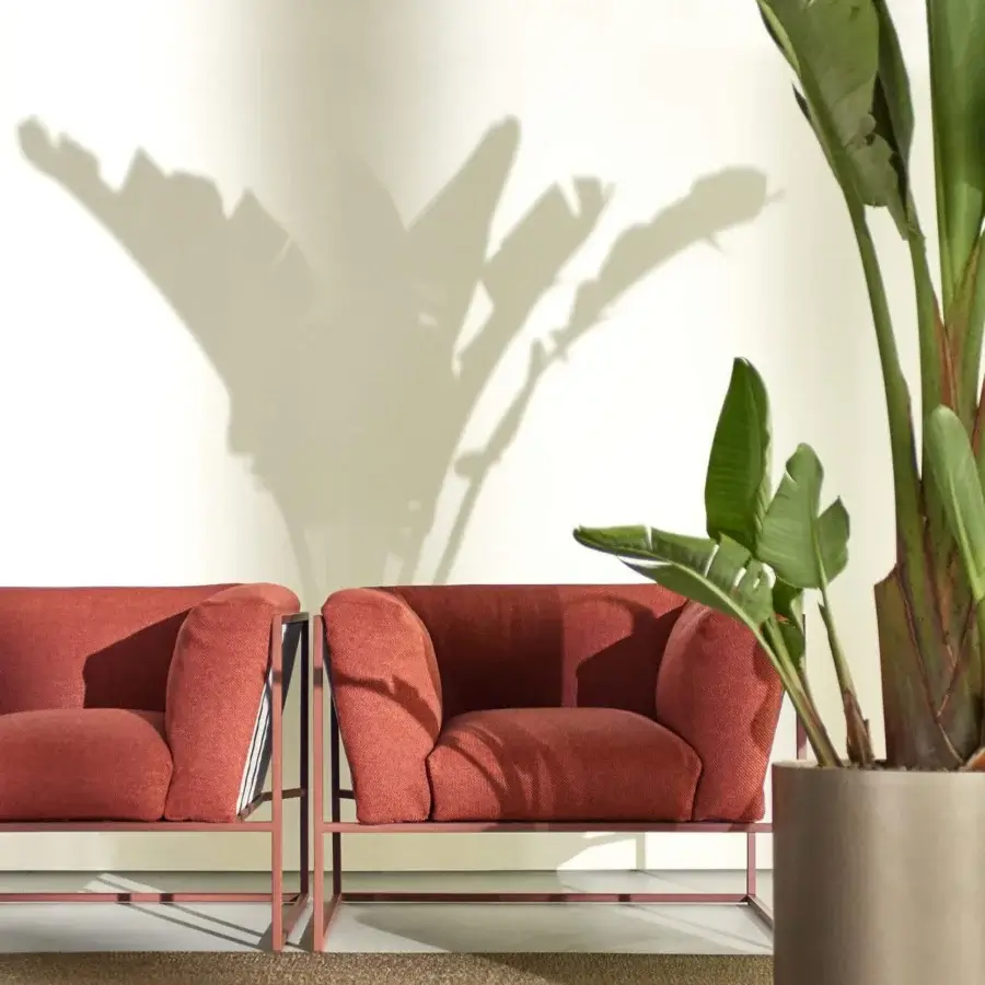 Exceptional MDF Italia Arpa lounge chair with reddish-brown woven cord and matte corten epoxy powder-coated stainless steel frame