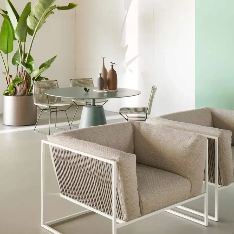 Exceptional MDF Italia Arpa lounge chair with white epoxy powder coated stainless steel frame and beige woven textile backrest