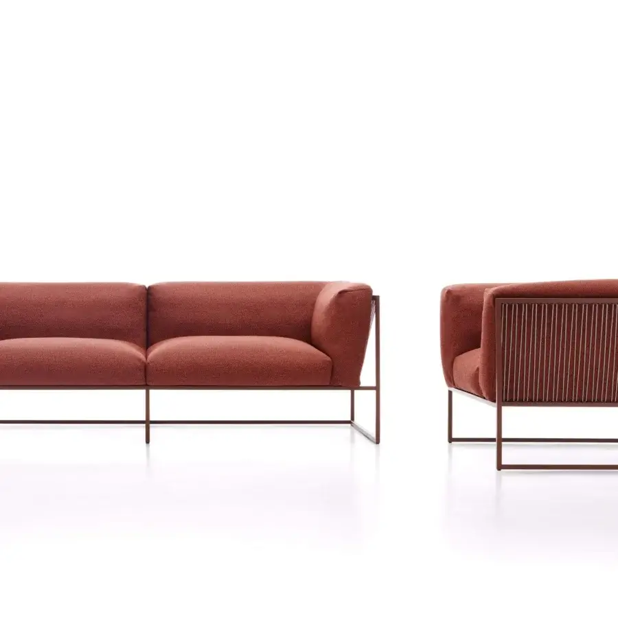 Exceptional MDF Italia Arpa lounge chair with reddish-brown hue and stainless steel frame, crafted in matt goffered corten finish with polyester cord weaving