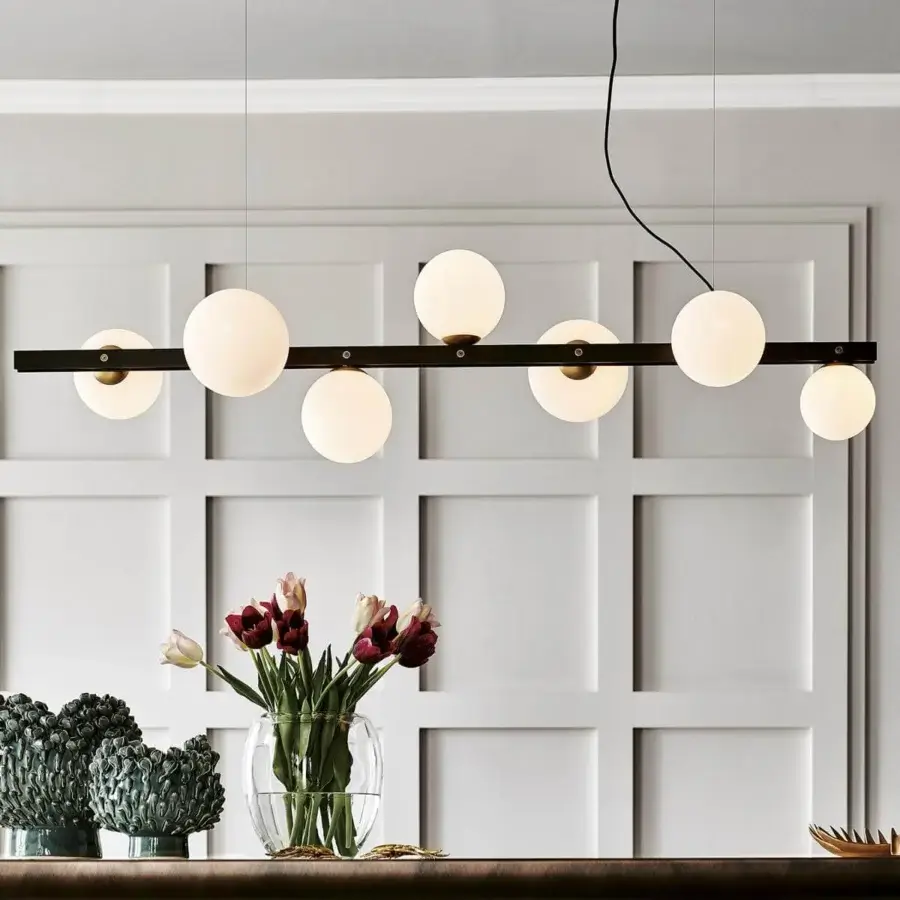 Elegant Cattelan Italia Planeta suspension lamp with spherical blown satin white glass shades and burnished steel built with brushed brass accents