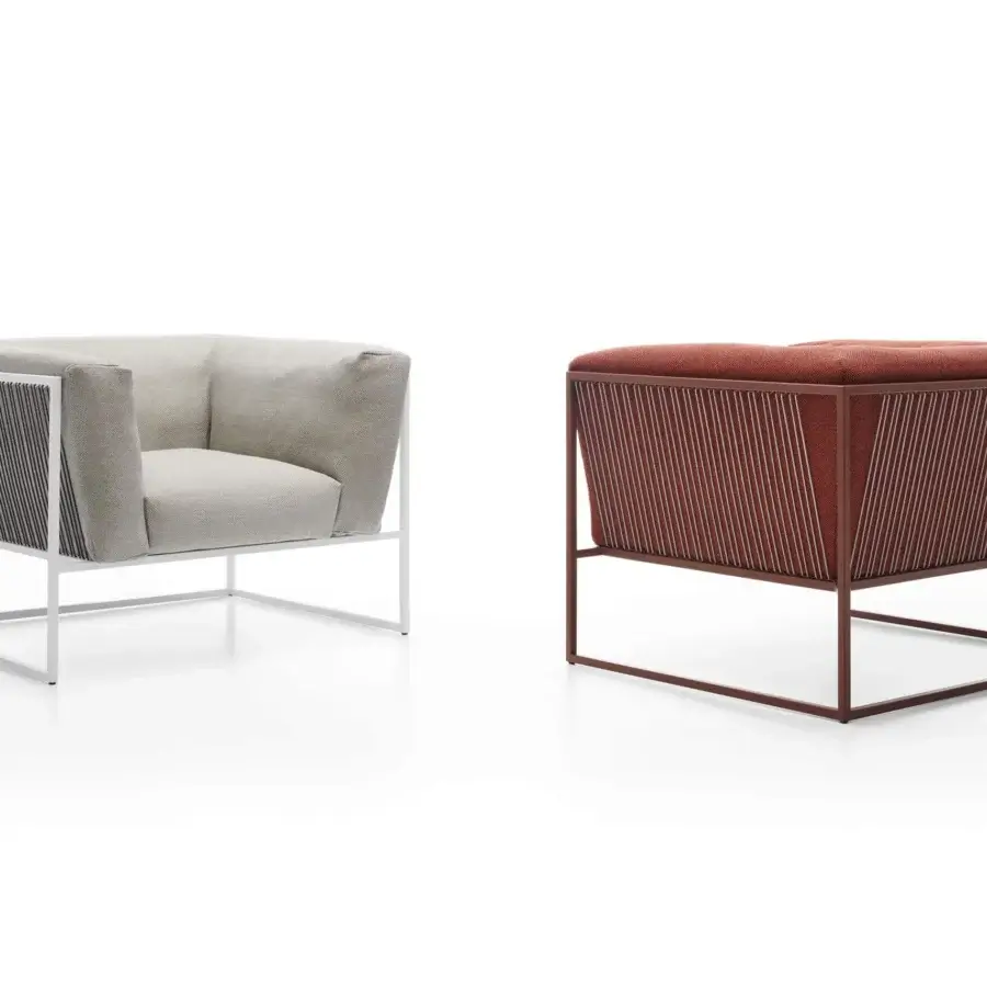 Elegant MDF Italia Arpa lounge chair with a white epoxy powder-coated stainless steel frame and light gray textile upholstery
