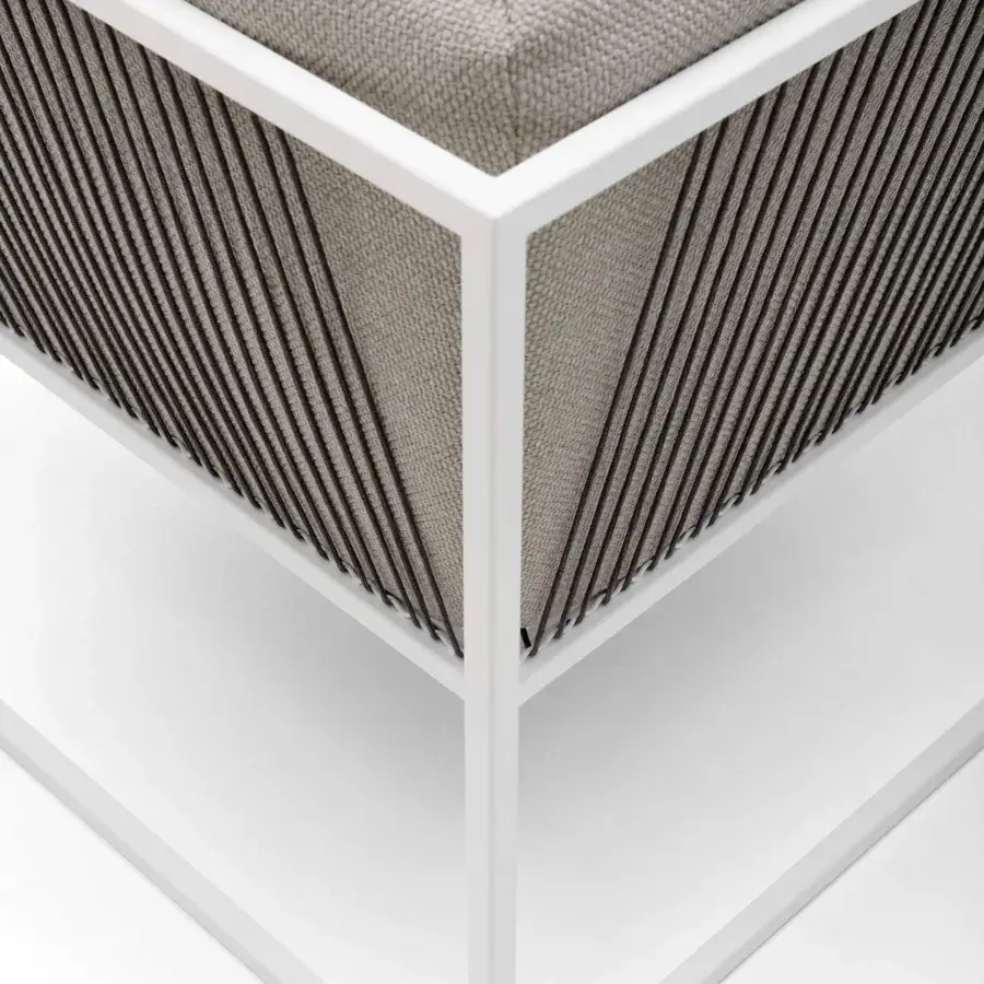 Elegant MDF Italia Arpa lounge chair with stainless steel frame and goffered white epoxy powder coated finish, woven with neutral beige cords