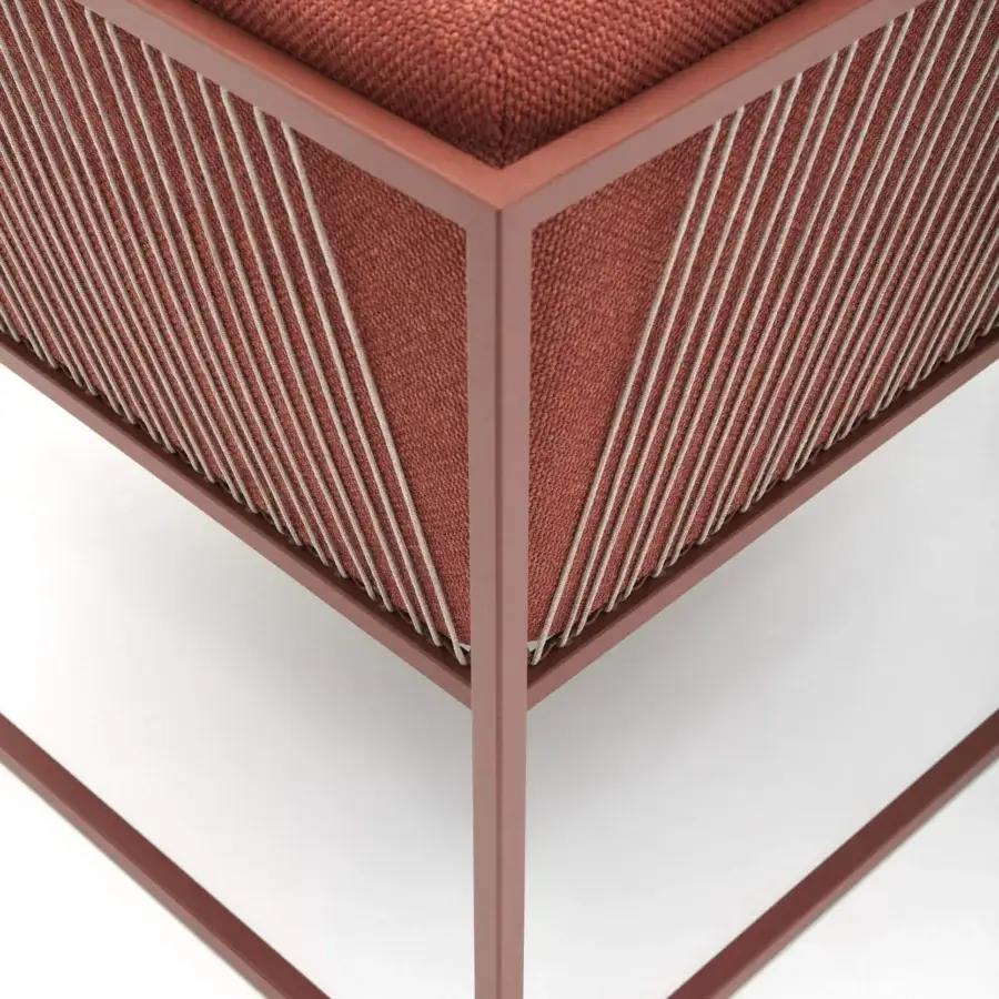 Captivating MDF Italia Arpa lounge chair with stainless steel frame and light-colored polyester cord weaving, plus reddish-brown cushion