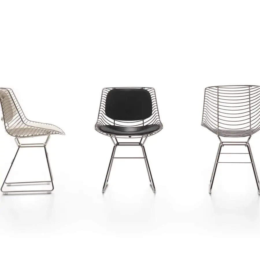 Captivating MDF Italia Flow Filo chair with a black Free Form polyurethane pad and glossy metal steel rod frame in a black nickel finish