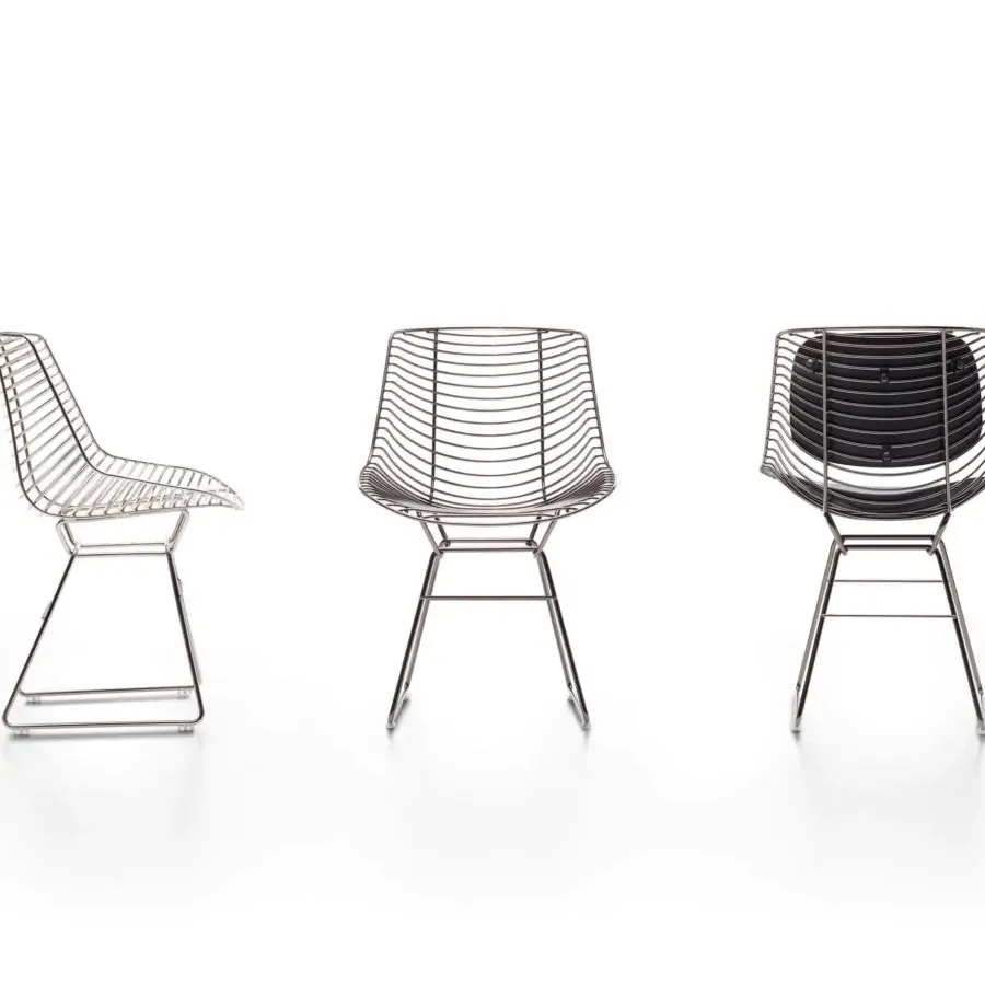 Superior MDF Italia Flow Filo chair with a black nickel steel frame and black Free Form polyurethane seat in a dark sheen finish