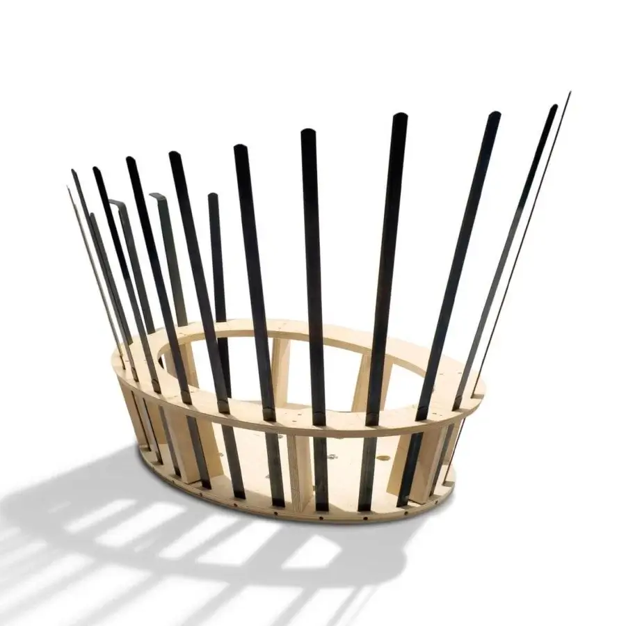Superior Giorgetti Arabella lounge chair with a basket design, dark metal rods, and removable refined fabric or leather upholstery