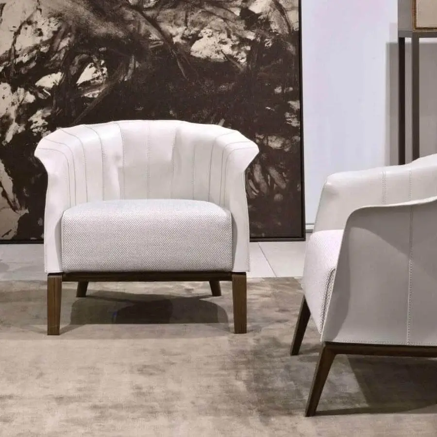 Lavish Giorgetti Aura lounge chair with curved canaletto walnut base and light gray textile seat featuring elegant vertical stripes